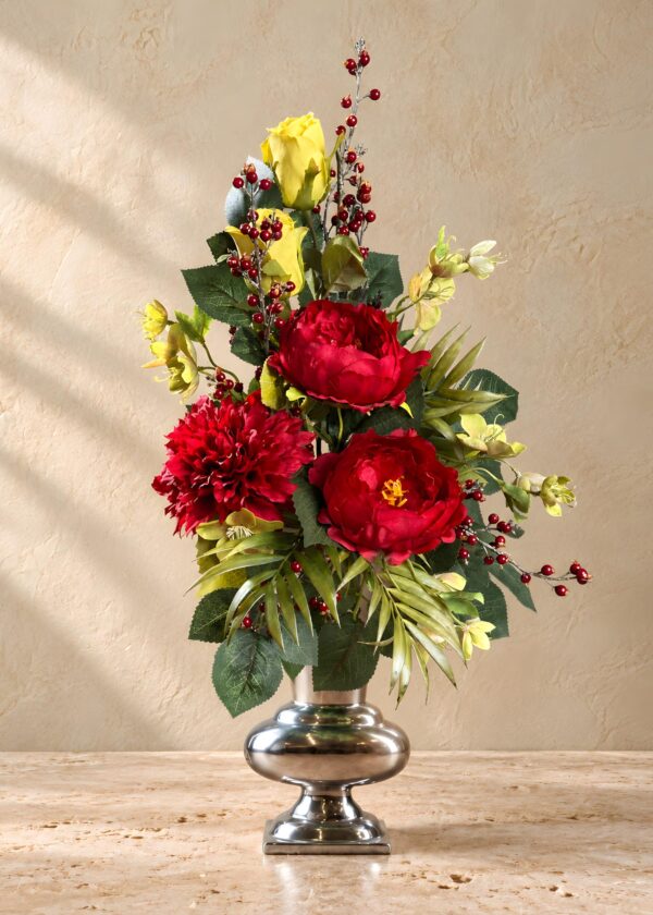 Mazzo di fiori per defunti rosso e giallo mostrato per intero nel vaso argentato non incluso
